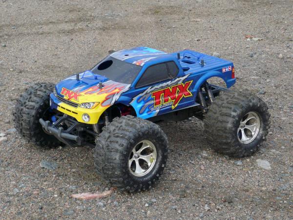 Tamiya TNX
4S lipo, KD36-74-09XL 1900kv, Mamba Max & CC BEC.
reversed transmission, Revo slipper & spur, E-Maxx a-arms, driveshafts, big bore shocks, etc. minor mods... :)